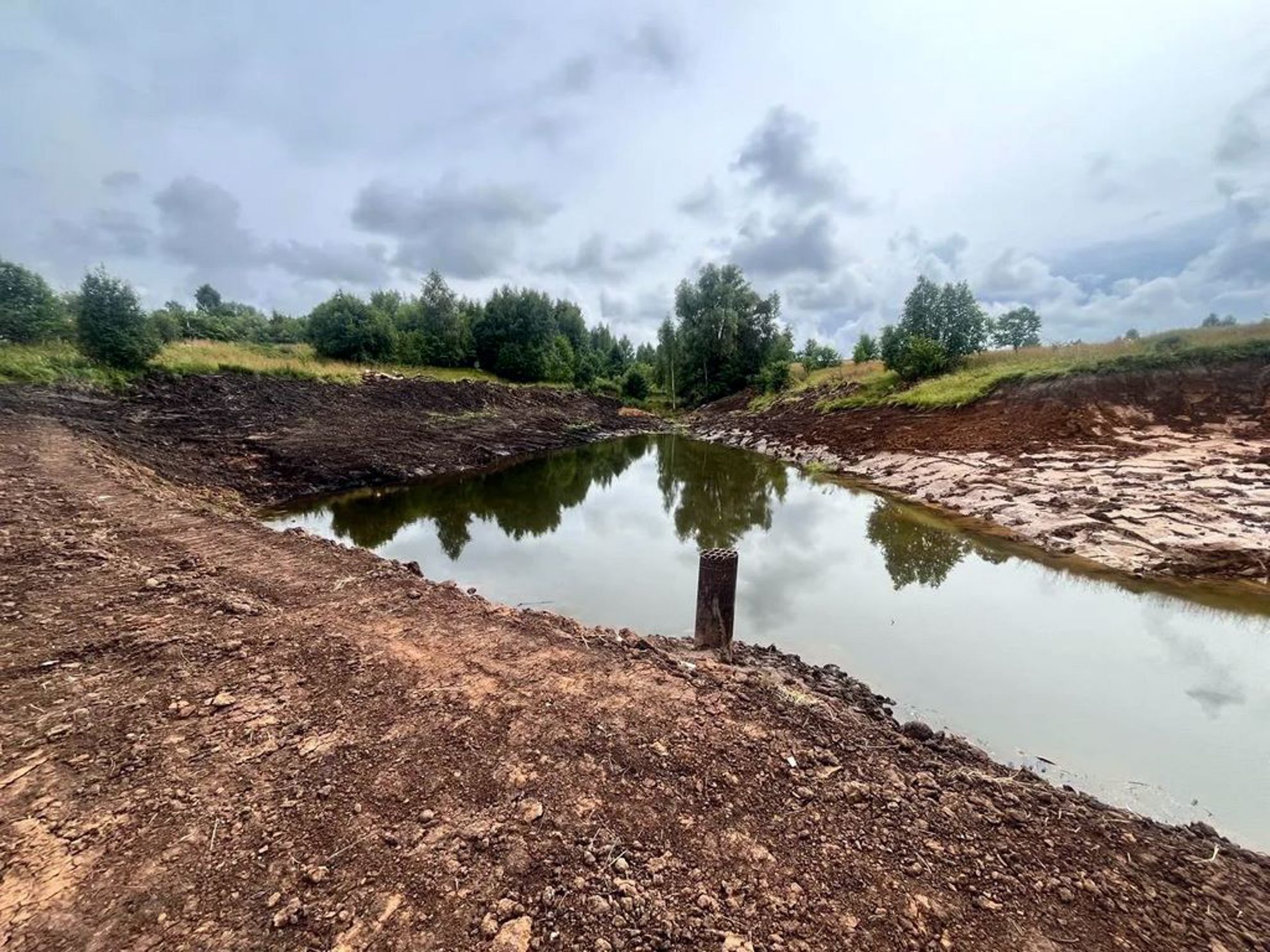 Очистка пожарного водоёма в деревне Токшики завершена